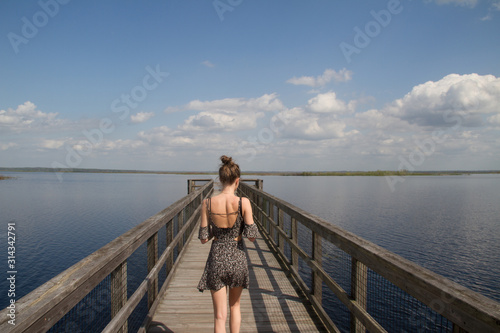 young woman on the pier