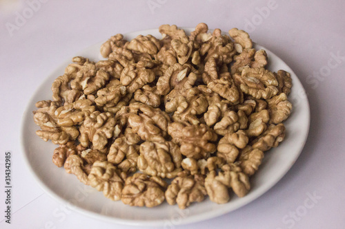  Walnuts in a white plate