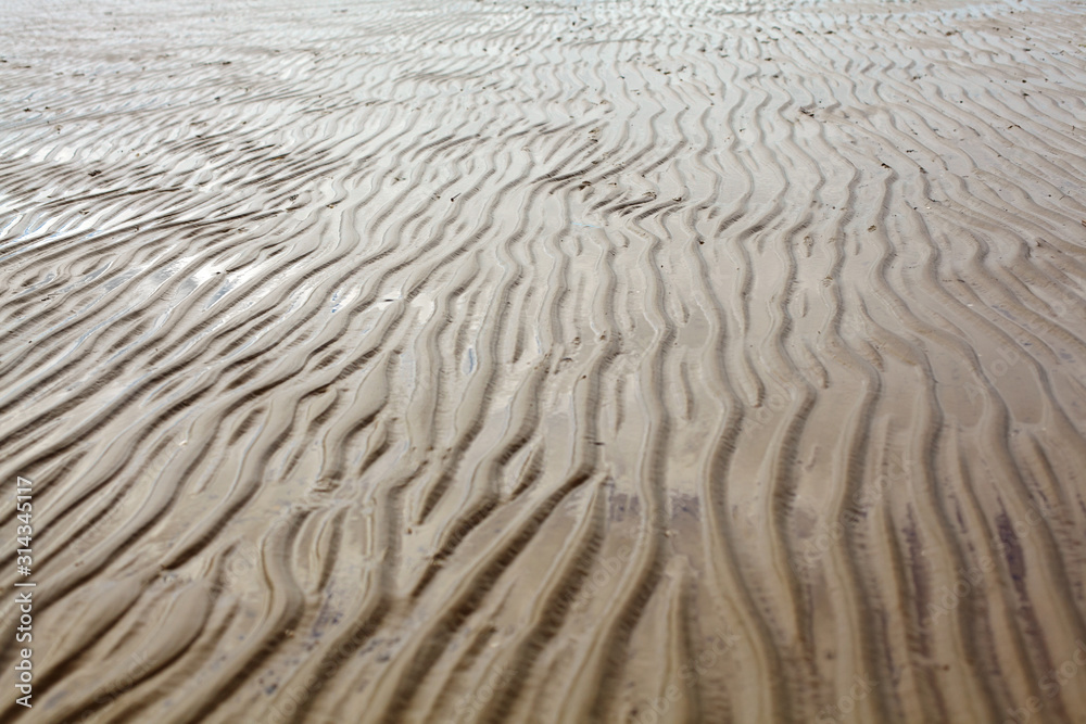 sand waves on the sand from the sea sand waves on the sand from the sea