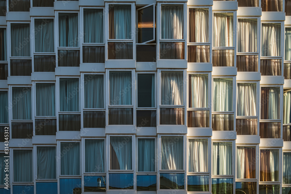 Eclectic glazed facade of an urban building Eclectic glazed facade of an urban building