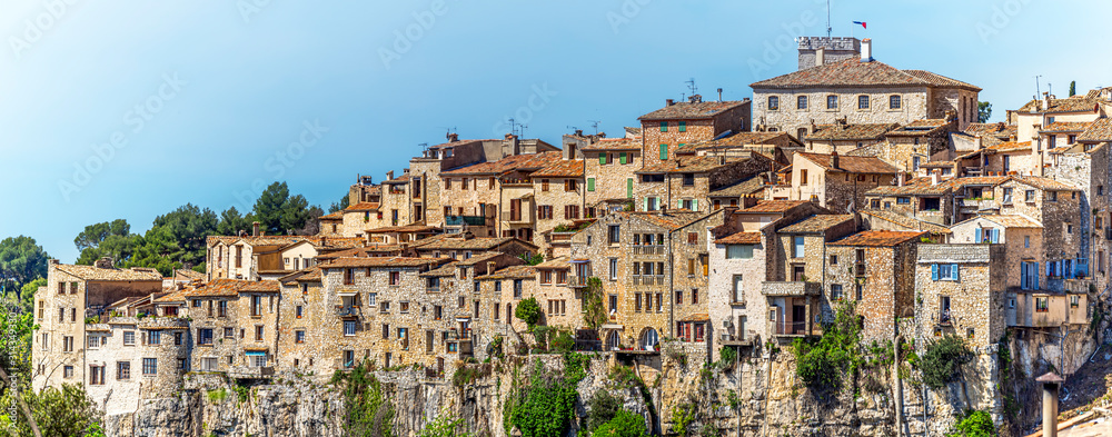 Panoramic view of Tourrettes-sur-Loup medieval village from Cassan Valley. Southeastern France, Alpes Maritimes.