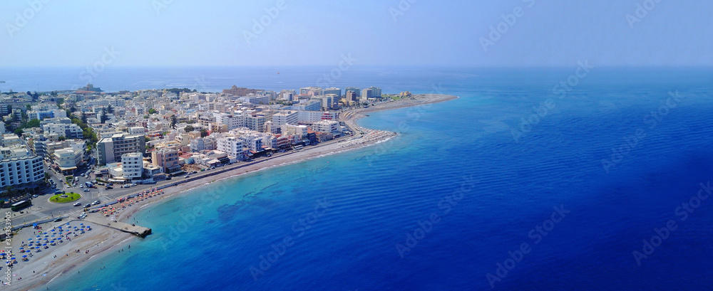 Aerial drone ultra wide top down photo of popular crowded Elli beach in main peninsula of Rodos island, Dodecanese, Greece