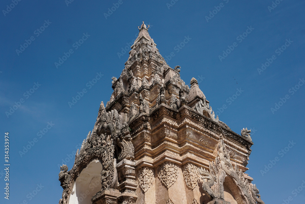Northern Thai Style Buddhist arch against the sky