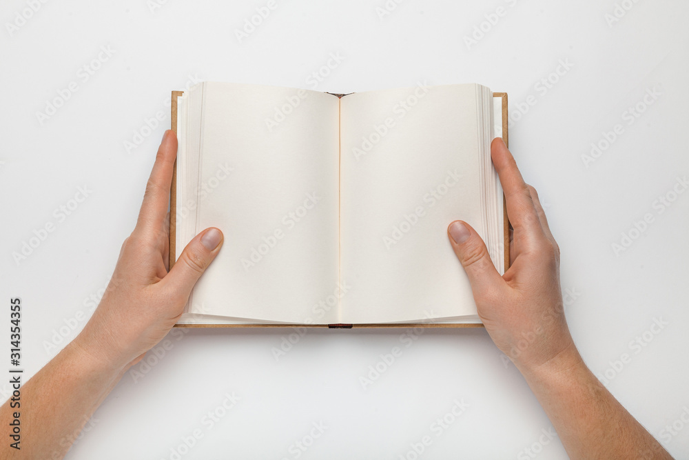 A5 open book mockup with hands. Empty template of page. Blank for design. Isolated on white background. A5 open book mockup with hands. Empty template of page. Blank for design. Isolated on white background.