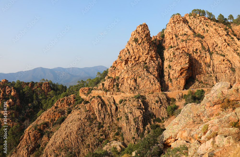 Red rocks on the Calanches Place in Corsica in France near Piana Red rocks on the Calanches Place in Corsica in France near Piana