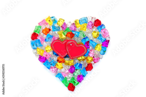 Heart shape made of colored transparent stones