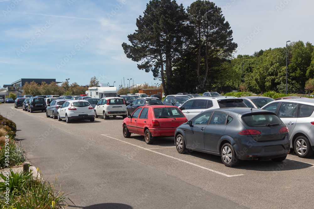 Fototapeta premium Cars parked in a parking in France