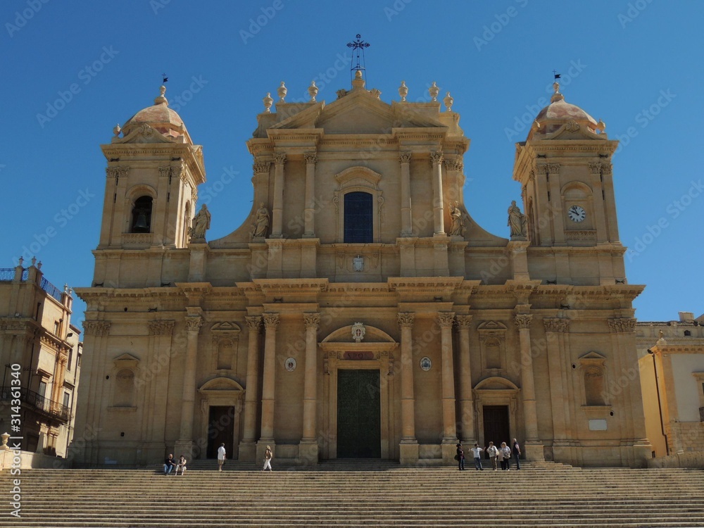 Noto – Cathedral of San Nicolò facade in baroque style with two towers, columns, dome and staircase