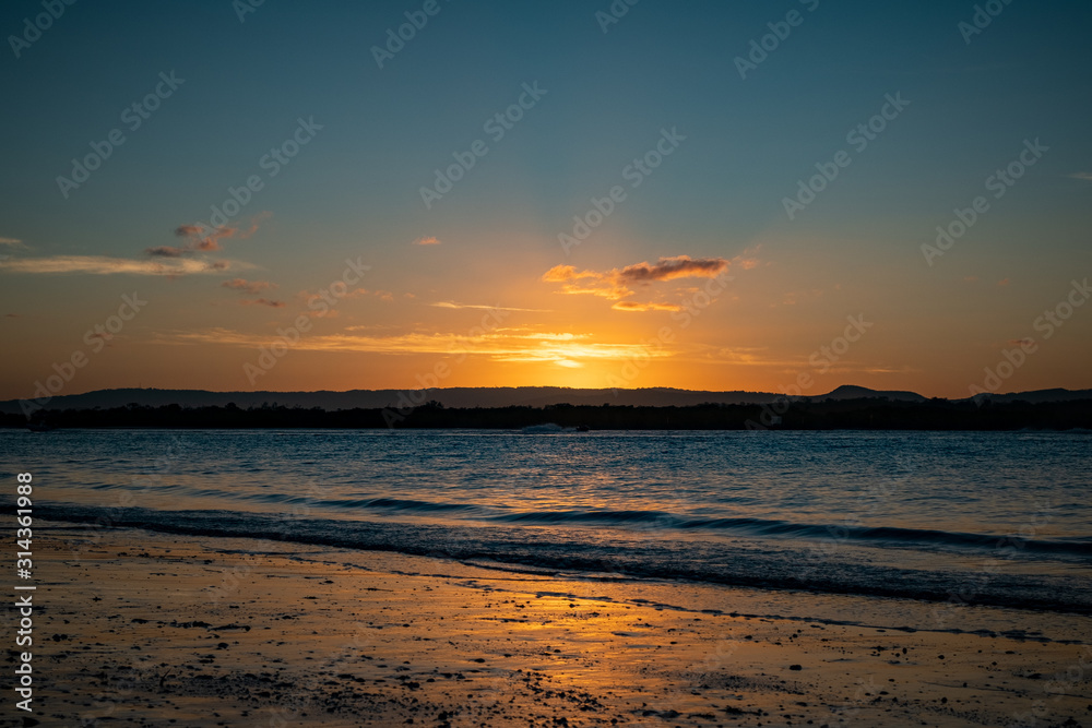Beautiful evening sunset at Stradbroke Island overlooking the ocean and shoreline