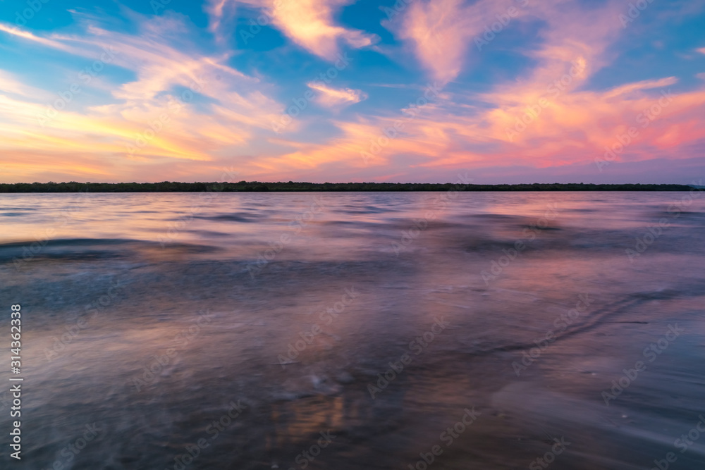 Beautiful evening sunset at Stradbroke Island overlooking the ocean and shoreline