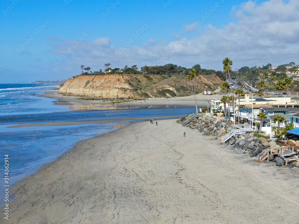 Aerial view of Del Mar North Beach, California coastal cliffs and House with blue Pacific ocean. San Diego County, California, USA
