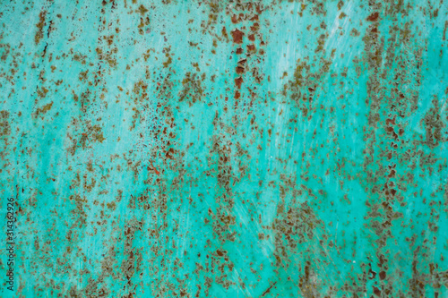 rusty metal texture and turquoise paint close up