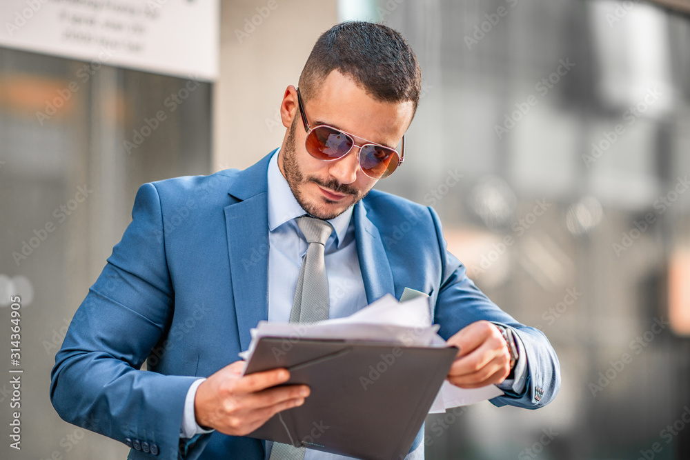 Portrait of businessman in blue suit Portrait of businessman in blue suit