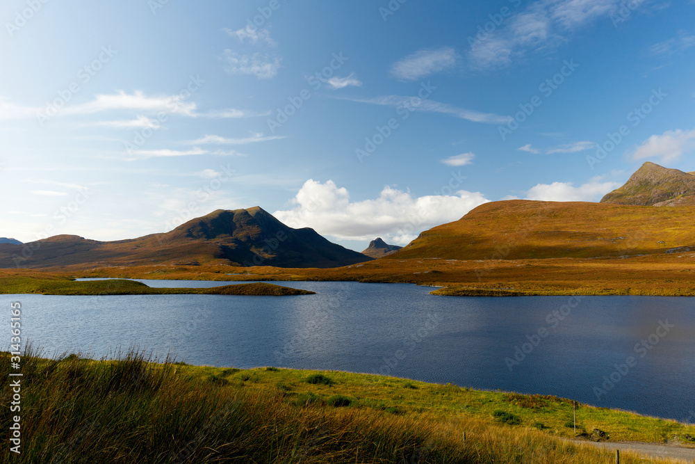 Idyllic scenery with a mountain range and a lake in Scotland