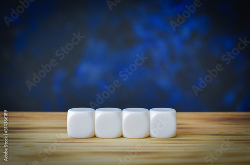 wooden cubes on table background, for including a business message