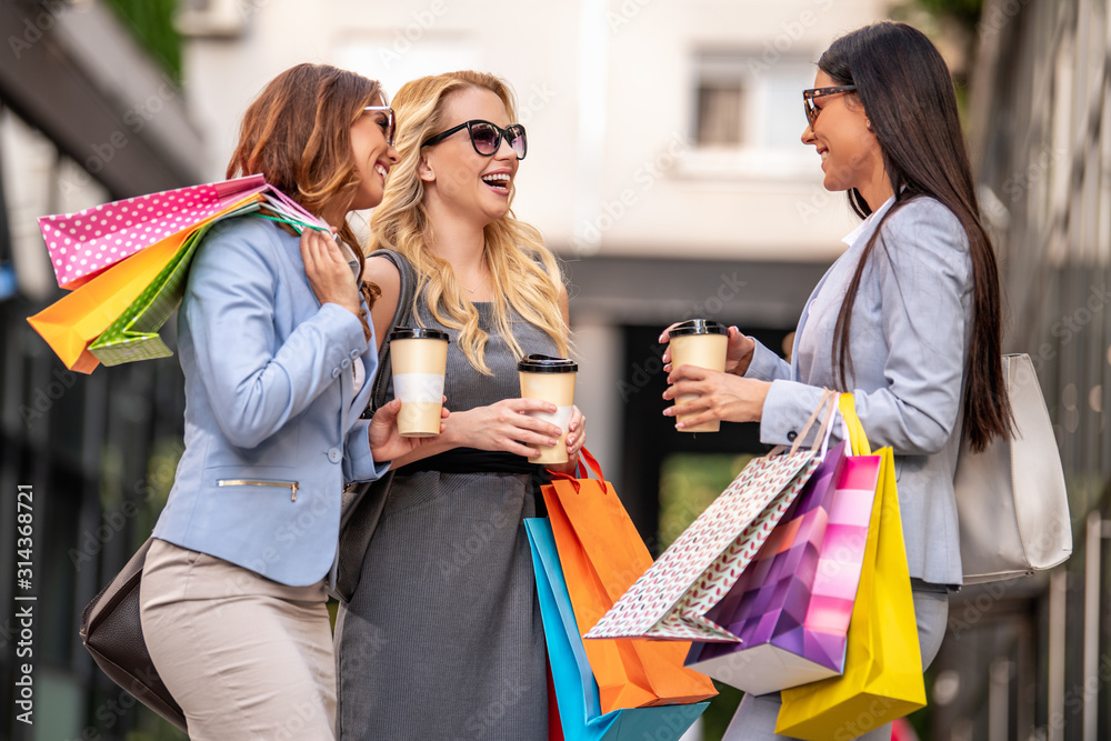 Happy smiling women in shopping Happy smiling women in shopping