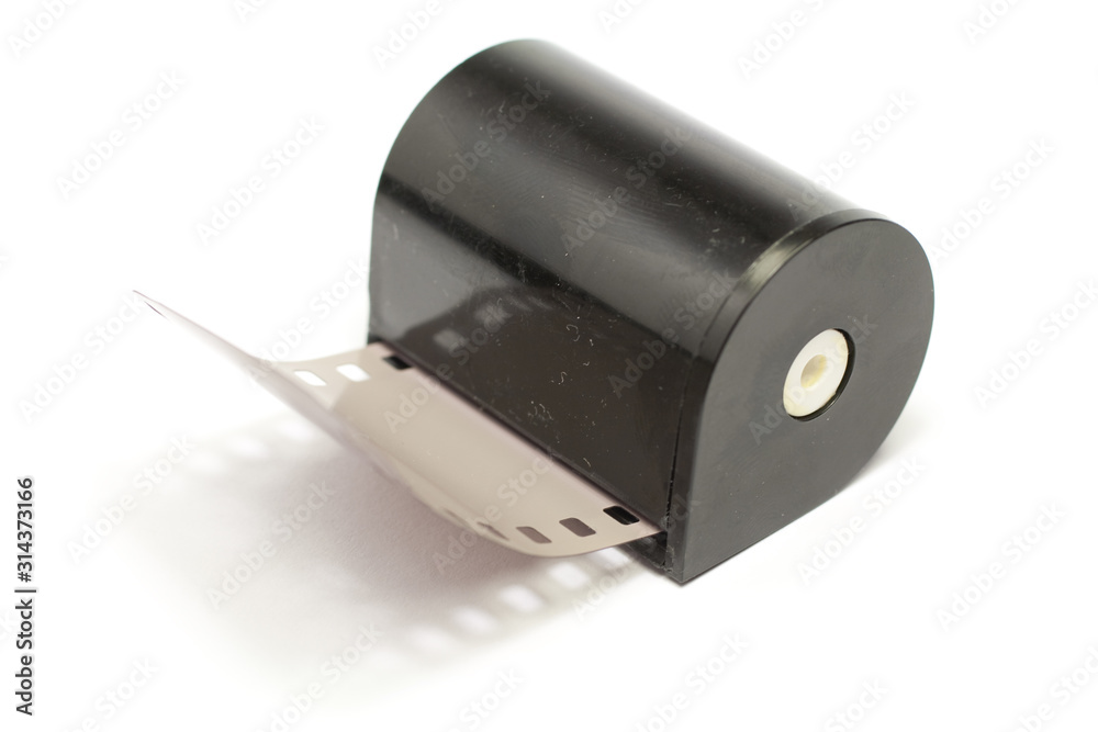 Old camera film on isolated white background Old camera film on isolated white background
