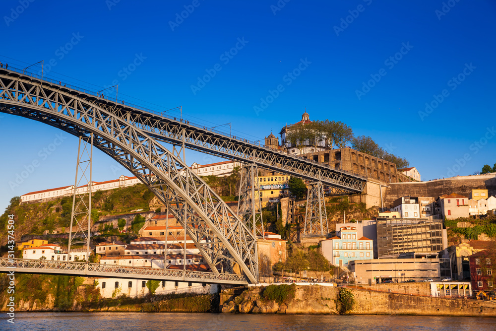 Obraz premium Dom Luis I Bridge a metal arch bridge over the Douro River between the cities of Porto and Vila Nova de Gaia in Portugal inaugurated in 1886