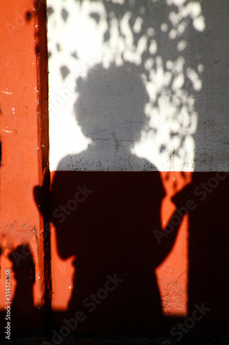 Girl's shadow in the wall 