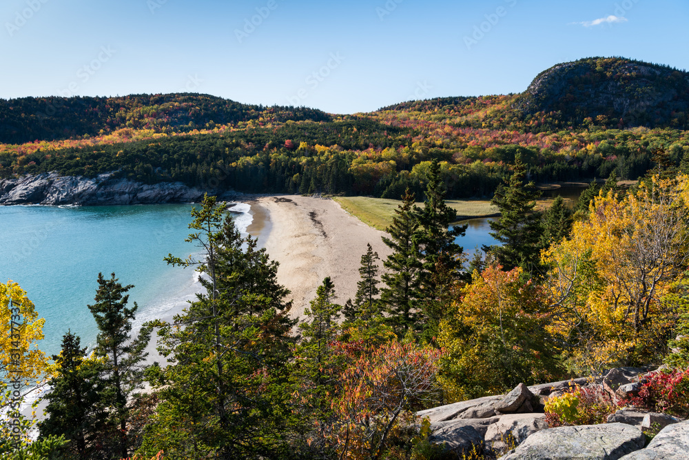 Fall colors, mountains, and a sandy beach in Acadia National Park