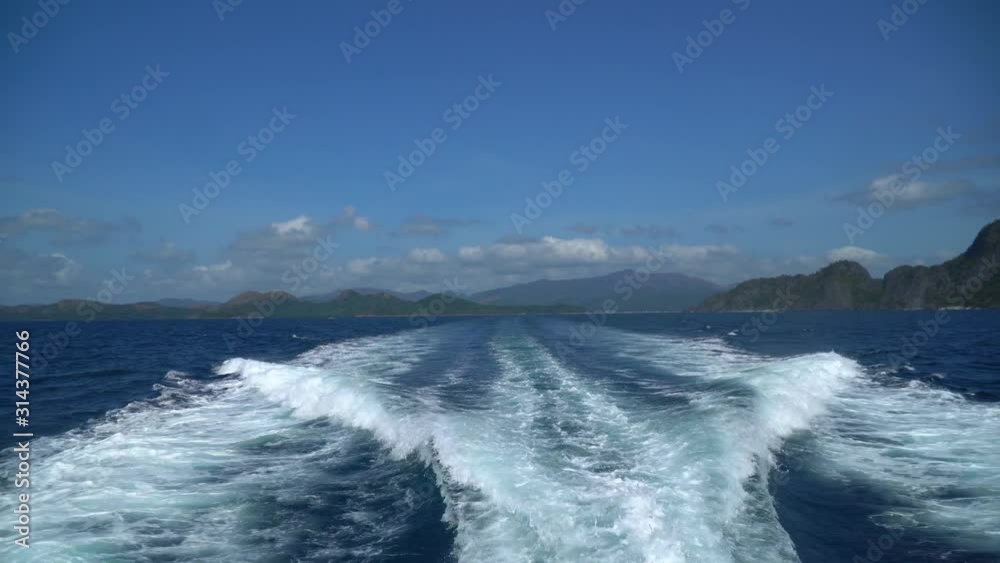 A trail in the ocean made by ferry at El Nido, Philiphine