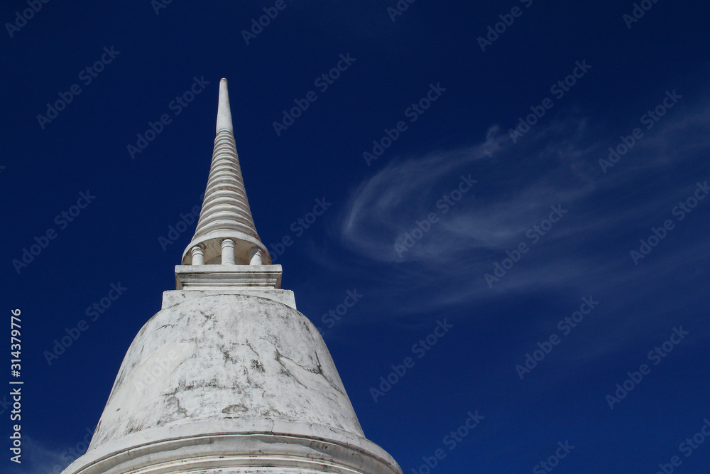 stupa at noon under blue sky Background