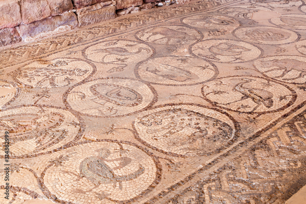 Mosaic at the floor of the Byzantine Church ruin in the ancient city Petra, Jordan