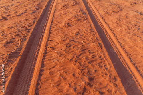 Tire tracks on a sand dune in Wadi Rum desert, Jordan