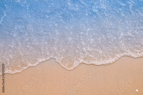Fototapeta Naklejka Na Ścianę i Meble -  Soft wave on sandy beach. Background.