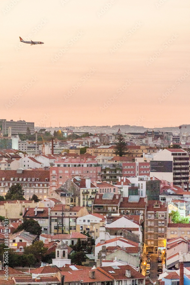 Skyline of evening Lisbon from Miradouro da Graca viewpoint, Portugal
