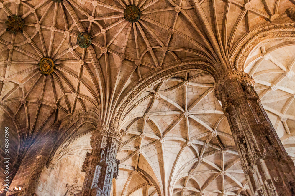 LISBON, PORTUGAL - OCTOBER 11, 2017: Gothic vaulted ceiling of a church in Jeronimos (Hieronymites) monastery in Lisbon, Portugal