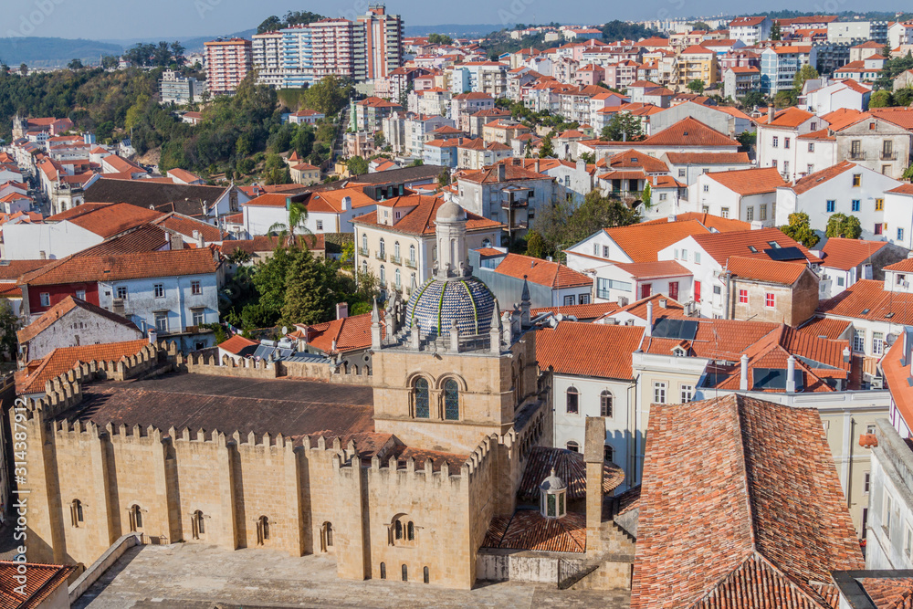City skyline and the Old Cathedral  (Se Velha) of Coimbra, Portugal.