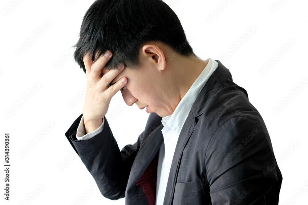 A man sitting down, his face unsettled. He has headaches and stress. Cause of hard work and insufficient rest. A man sitting down, his face unsettled. He has headaches and stress. Cause of hard work and insufficient rest.