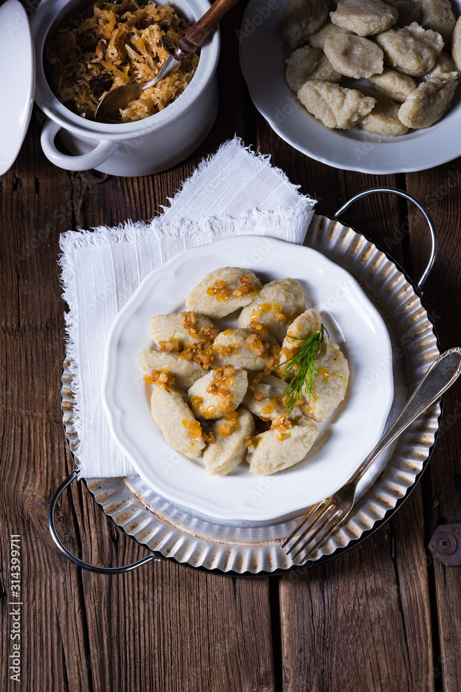 Szare kluski, Polish dumplings with sauerkraut Szare kluski, Polish dumplings with sauerkraut