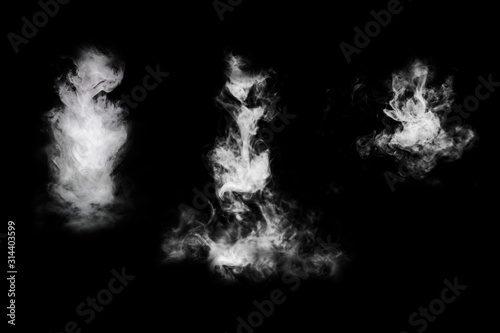 Fog or smoke set isolated on black background. White cloudiness, mist or smog background.