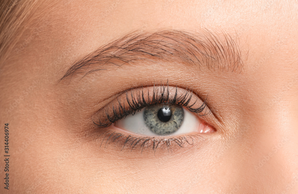 Young woman with beautiful eyebrows, closeup Young woman with beautiful eyebrows, closeup