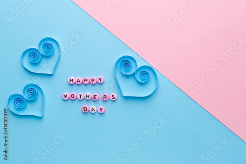 Text HAPPY MOTHER'S DAY on color background photo