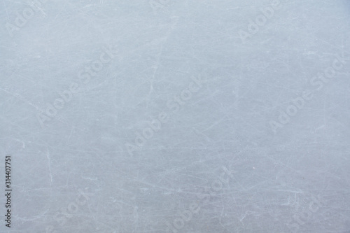 Ice hockey rink scratches surface abstract background.