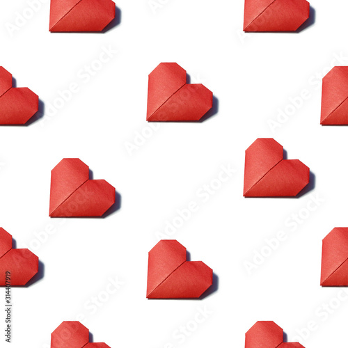 red origami heart folded from colored paper isolated on white background with sharp dark shadow seamless pattern. Love, valentines day, passion concept