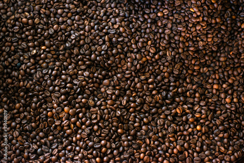 Roasted coffee beans background.Mixture of different kinds of coffee beans. Coffee concept.can be used as a background.