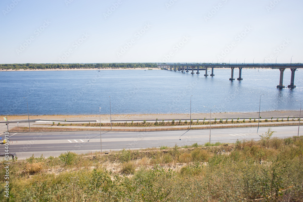 View of the bridge across the Volga River. The bridge connects two banks of the river. Dancing bridge