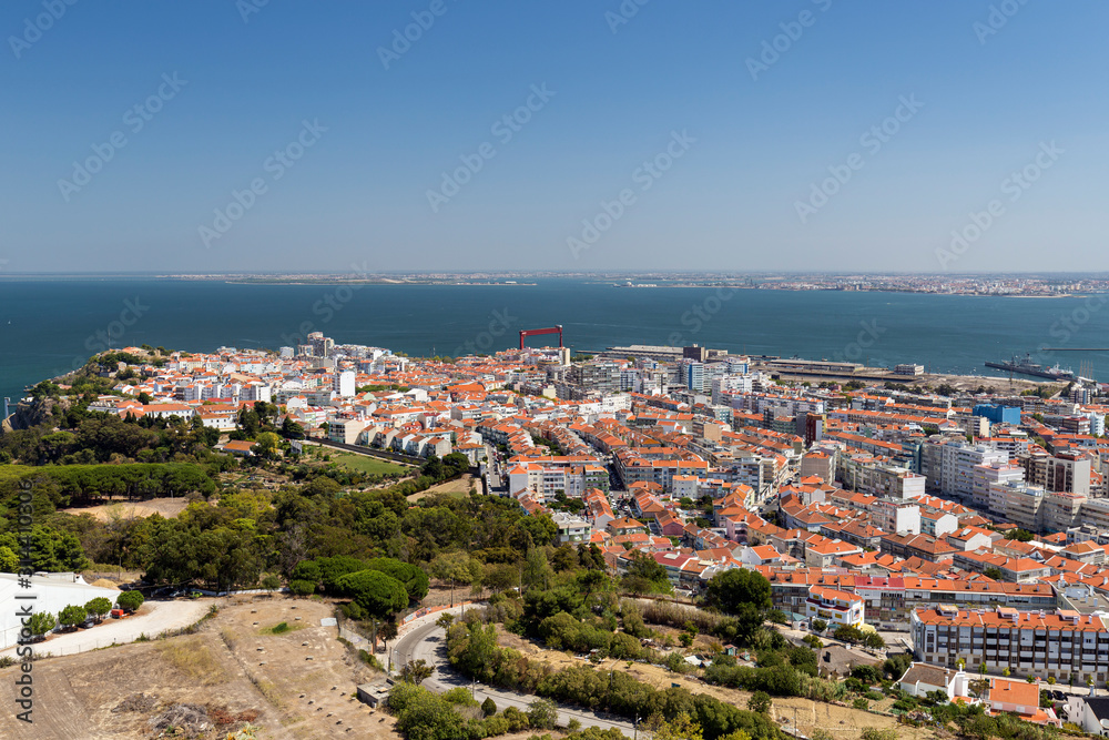 Almada city and Tagus River in Portugal viewed from above on a sunny day in the summer.