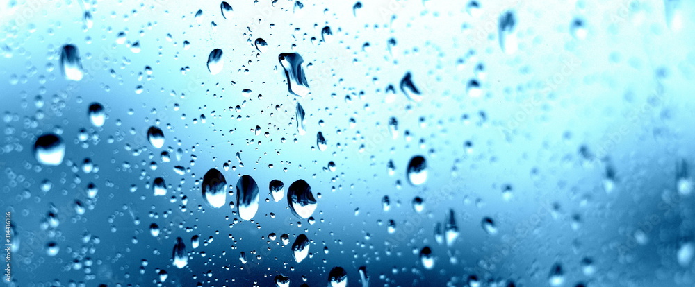 Raindrops on the window. Close-up of water on the glass. After the rain. - obrazy, fototapety, plakaty 