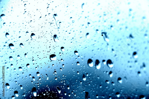 Raindrops on the window. Close-up of water on the glass. After the rain.