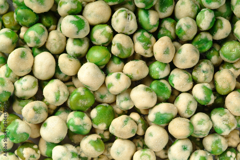 nuts or green pea with crispy coated on a background new. nuts or green pea with crispy coated on a background new.