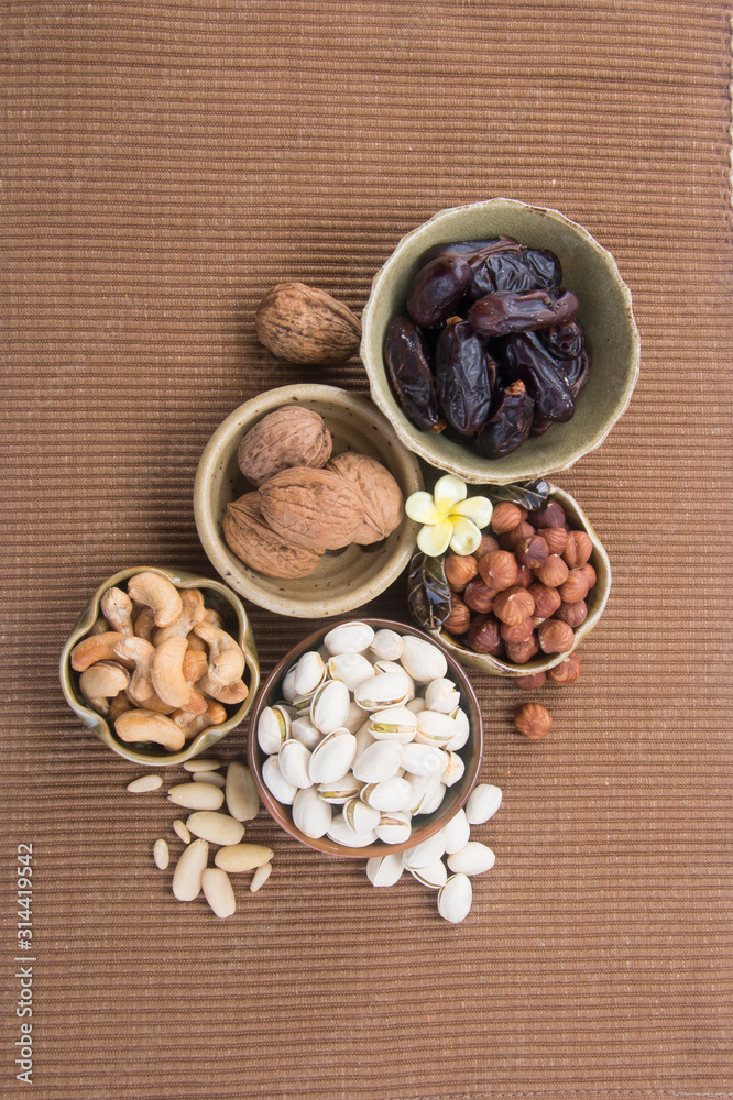 nuts or hazelnuts nuts and mix nut on a background new. nuts or hazelnuts nuts and mix nut on a background new.