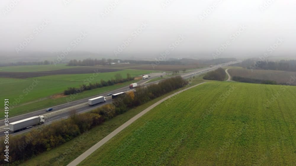aerial view of a heavy truck moving on the autobahn aerial view of a heavy truck moving on the autobahn