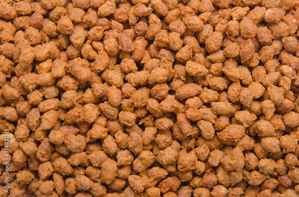 nuts or Peanuts with Crispy Coated on a background new. nuts or Peanuts with Crispy Coated on a background new.
