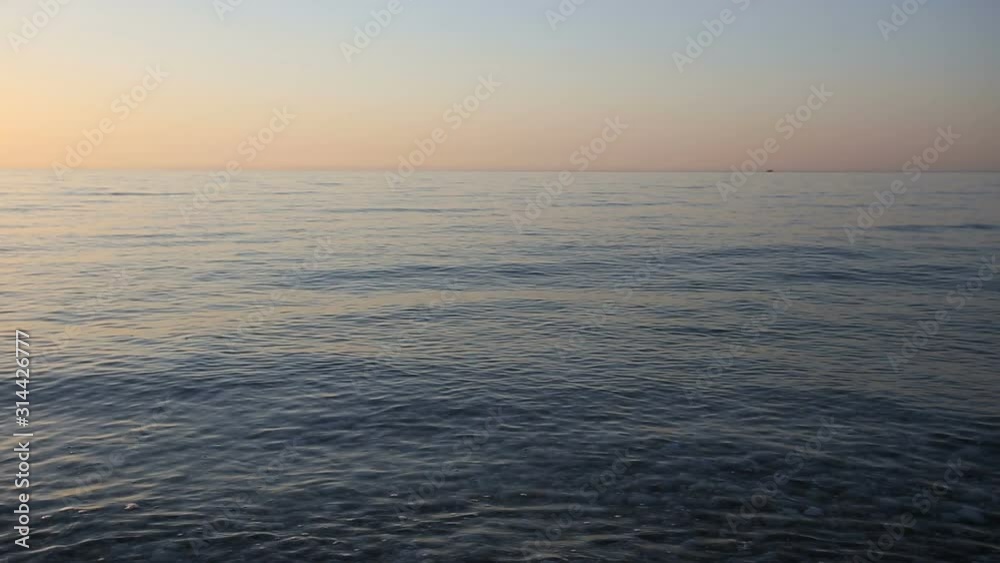 Transparent blue water on the morning sea