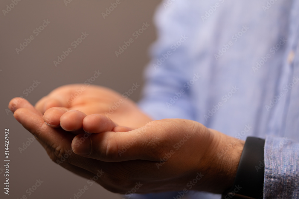 Businessman without head holding something without theme Businessman without head holding something without theme